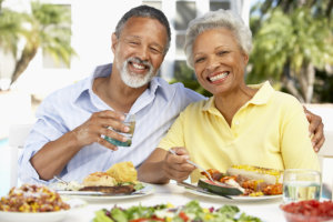 elderly couple having their meal